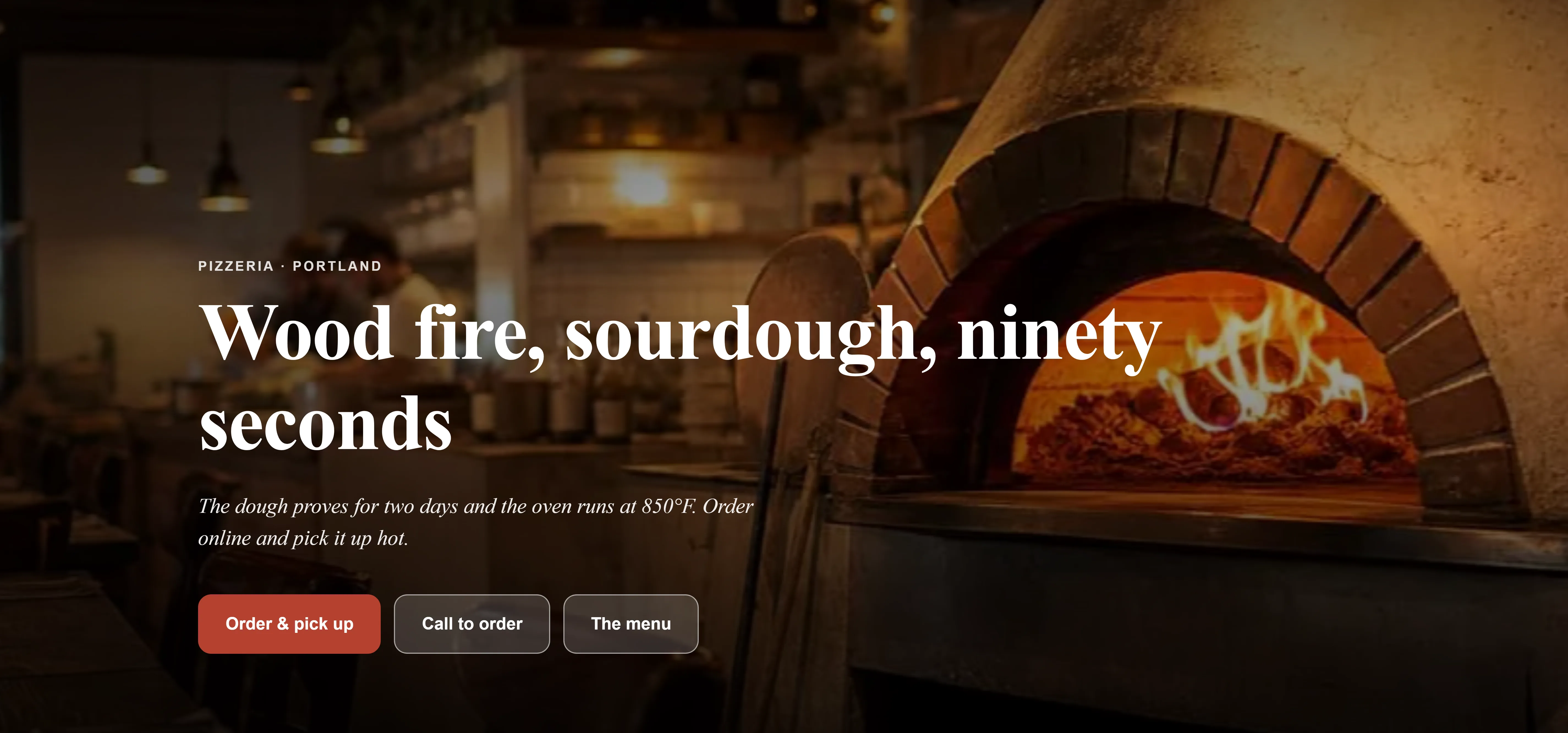 The top of the pizzeria Vulcano's site, in English: the name, the line Wood fire, sourdough, ninety seconds, an Order now button and the opening hours — a site built from what the owner entered