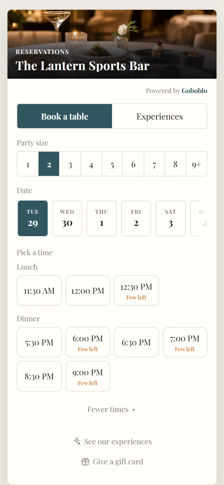 The reservation widget in the Elegant theme with a teal accent and a photo of a set table, lunch and dinner times (demo)